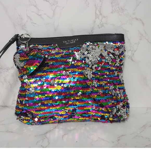 Victoria's Secret Handbags - VICTORIA'S SECRET Rainbow Sequin Reversible Wristlet w/ Heart Charm - NWOT